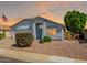 Charming single-story home with desert landscaping and attached garage at 13416 W Ventura St, Surprise, AZ 85379