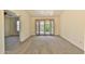 Comfortable living room featuring neutral carpet, and sliding glass doors at 14235 N 26Th Dr, Phoenix, AZ 85023