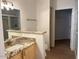 Modern bathroom featuring wood cabinets, granite countertops, and a walk-in shower at 15225 N 100Th St # 1220, Scottsdale, AZ 85260