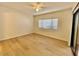 Bright bedroom with a window and modern flooring at 15225 N 100Th St # 1220, Scottsdale, AZ 85260