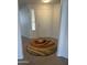 Bright entryway featuring neutral walls, tile flooring, and a vibrant, colorful round rug at 15225 N 100Th St # 1220, Scottsdale, AZ 85260