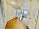 Bright entryway featuring wood-look tile flooring and a view into the adjacent living space at 15225 N 100Th St # 1220, Scottsdale, AZ 85260