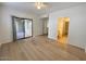 Spacious living room with ample natural light and wood flooring at 15225 N 100Th St # 1220, Scottsdale, AZ 85260