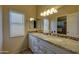 Spacious bathroom with dual sinks, granite countertops, and ample storage space at 15273 S 31St St, Phoenix, AZ 85048