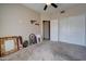 Carpeted bedroom with a ceiling fan, closet and neutral walls at 15273 S 31St St, Phoenix, AZ 85048