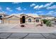 Charming single-story home featuring a stucco exterior, desert landscaping, and a two-car garage at 15273 S 31St St, Phoenix, AZ 85048