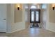 Open foyer featuring tile flooring and an elegant double door entry with sidelights at 15273 S 31St St, Phoenix, AZ 85048