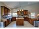 Gourmet kitchen featuring stainless steel appliances, granite counters, and ample counter space at 15273 S 31St St, Phoenix, AZ 85048