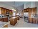 Gourmet kitchen featuring stainless steel appliances, granite counters, and an island with breakfast bar at 15273 S 31St St, Phoenix, AZ 85048