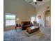 Inviting living room features high ceilings, large windows, and neutral decor at 15273 S 31St St, Phoenix, AZ 85048