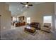 Open concept living room with vaulted ceilings, neutral color palette, and seamless flow to the kitchen at 15273 S 31St St, Phoenix, AZ 85048