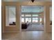 Spacious living room with neutral carpet, recessed lighting, and ample natural light at 15273 S 31St St, Phoenix, AZ 85048