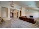 Comfortable living room boasts high ceilings, neutral tones, and plenty of natural light at 15273 S 31St St, Phoenix, AZ 85048