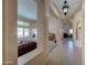Open-concept home featuring an arched entry, a living room, and neutral-toned walls at 15273 S 31St St, Phoenix, AZ 85048