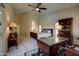 Spacious primary bedroom featuring carpet floors, high ceilings, and large windows at 15273 S 31St St, Phoenix, AZ 85048