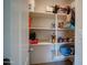 Walk-in pantry with ample shelving for organized storage of food and household items at 15273 S 31St St, Phoenix, AZ 85048