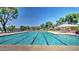 Long community swimming pool for laps with lounge chairs at 15273 S 31St St, Phoenix, AZ 85048