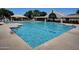 Large community pool with clear blue water for relaxation and exercise at 15273 S 31St St, Phoenix, AZ 85048