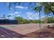 Outdoor basketball court with mountain views and well-maintained surface at 16861 N 106Th Way, Scottsdale, AZ 85255