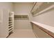 Spacious walk-in closet offering ample storage and shelving for organized living at 16861 N 106Th Way, Scottsdale, AZ 85255