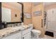 Bright bathroom featuring granite countertops, framed mirror and combination tub/shower at 18622 N 28Th Way, Phoenix, AZ 85050