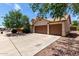Charming home featuring a wide driveway, 3-car garage, desert landscaping and mature shade trees at 18622 N 28Th Way, Phoenix, AZ 85050