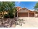 Charming home with a three-car garage, tile roof, and desert landscaping under a sunny sky at 18622 N 28Th Way, Phoenix, AZ 85050