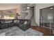 Spacious living room features a staircase and access to other areas of the home at 18807 N 42Nd Ave, Glendale, AZ 85308
