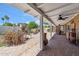 Outdoor entertaining space featuring a brick patio, outdoor kitchen, and comfortable seating at 2013 E Solano Dr, Phoenix, AZ 85016