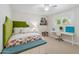 Cozy bedroom with ample natural light, built-in storage, and designer furnishings at 2013 E Solano Dr, Phoenix, AZ 85016