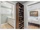 Hallway features a shoe rack, bathroom, and bedroom in view at 2013 E Solano Dr, Phoenix, AZ 85016