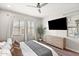 Beautiful main bedroom with custom wall detail and bright light at 20563 E Carriage Way, Queen Creek, AZ 85142