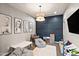 This fun playroom offers a place for reading and playing with a cute beanbag chair and wall decor at 20563 E Carriage Way, Queen Creek, AZ 85142