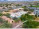 Aerial view of neighborhood park featuring a construction site with surrounding homes at 2222 W Morse Ct, Anthem, AZ 85086