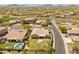 Panoramic aerial shot capturing the home's location, lush landscaping, and proximity to neighborhood amenities at 2222 W Morse Ct, Anthem, AZ 85086
