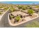 Stunning aerial view of the home in a beautiful neighborhood with mountain views and well-maintained landscaping at 2222 W Morse Ct, Anthem, AZ 85086