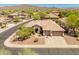 Attractive aerial view showcasing the home, desert landscaping, and a welcoming front yard at 2222 W Morse Ct, Anthem, AZ 85086