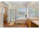 Bright bathroom features a separate shower, soaking tub, and dual sinks for convenience at 2222 W Morse Ct, Anthem, AZ 85086