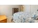 Comfortable bedroom with a tropical print bedspread and natural light from the window at 2222 W Morse Ct, Anthem, AZ 85086