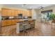 Bright kitchen with stainless steel appliances, center island, and breakfast nook at 2222 W Morse Ct, Anthem, AZ 85086