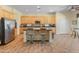 Spacious kitchen with stainless steel appliances and a large center island at 2222 W Morse Ct, Anthem, AZ 85086