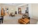 Inviting living area featuring an open layout, comfortable seating, dining area, and seamless flow into adjacent rooms at 2222 W Morse Ct, Anthem, AZ 85086