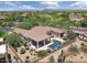 A spacious residence boasting an outdoor kitchen and a sparkling swimming pool at 22463 N 54Th St, Phoenix, AZ 85054