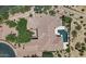 Aerial view of a luxury home showcasing the roofline and backyard pool at 22463 N 54Th St, Phoenix, AZ 85054