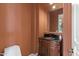 Elegant powder room with a decorative vanity, granite countertop, and designer fixtures at 22463 N 54Th St, Phoenix, AZ 85054
