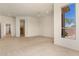 Large bedroom with neutral carpet, bright white walls, and an open layout at 22463 N 54Th St, Phoenix, AZ 85054