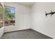 Bedroom with carpeted floor, TV wall mount and window overlooking the garden at 22463 N 54Th St, Phoenix, AZ 85054