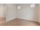 This carpeted bedroom boasts abundant natural light, creating a bright and welcoming atmosphere at 22463 N 54Th St, Phoenix, AZ 85054