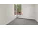 Bedroom with carpeted floor and window overlooking the garden at 22463 N 54Th St, Phoenix, AZ 85054