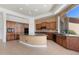 Gourmet kitchen featuring custom cabinets, granite counters and modern appliances at 22463 N 54Th St, Phoenix, AZ 85054
